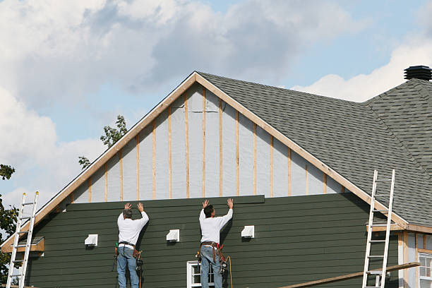 Professional Siding Contractor technician working in Graham, TX